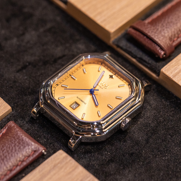 Chic green and blue women watches, focusing on their distinctive styles and colorful accessories.